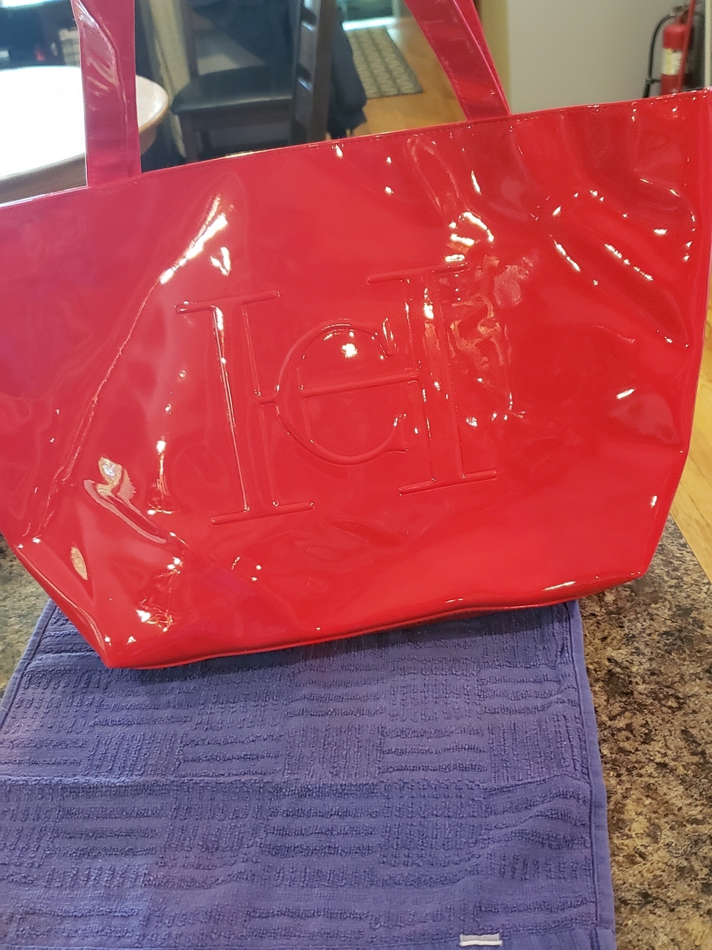 Good Girl Large Red Patent Tote with Embossed CH Logo .